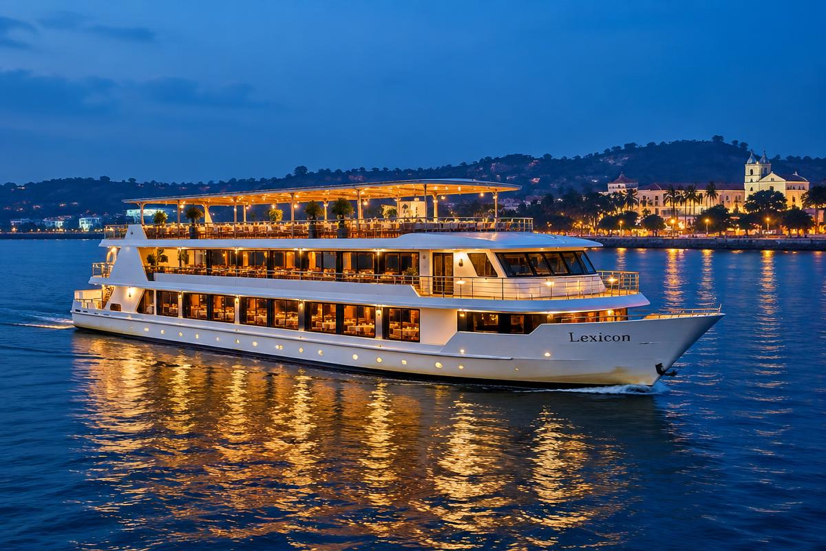 Lexicon Luxury Cruise sailing on the Mandovi River at blue hour